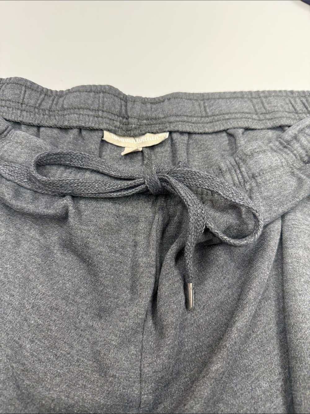 Woman within gray capris